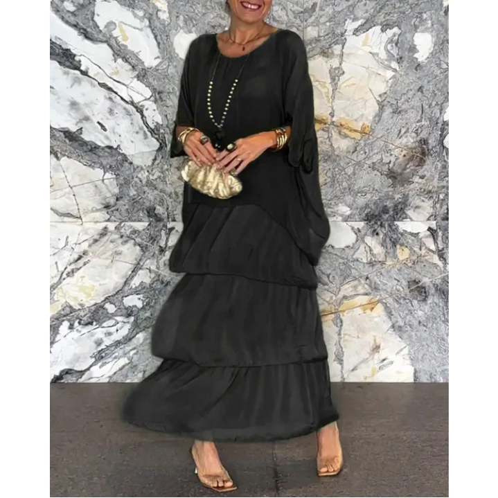 Elegant mesh dress with a round neckline and floral print