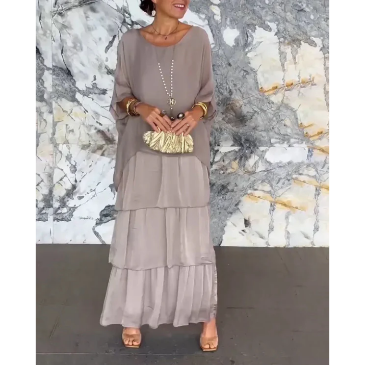 Elegant mesh dress with a round neckline and floral print